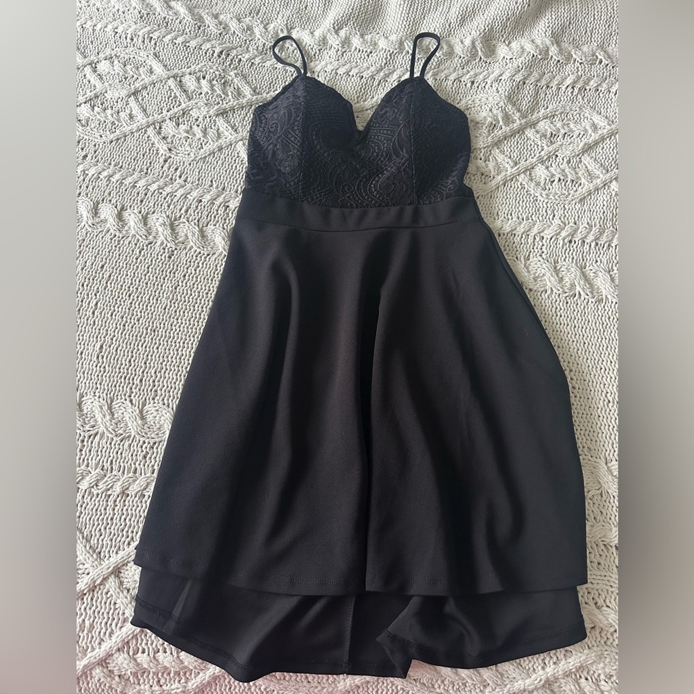 Short black dress with lace back